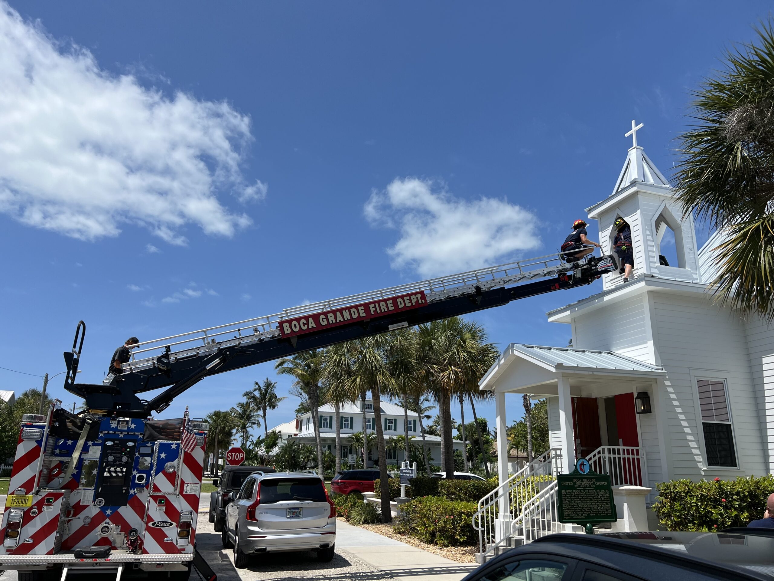 Fire Dept Aids Belfry Placement Boca Beacon