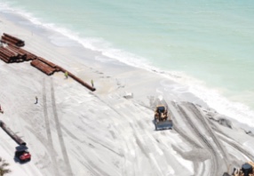 Beach renourishment moving along – Never mind the occasional pink water item-thumbnail